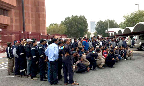 Workers protest in front of Indian embassy for unpaid salary