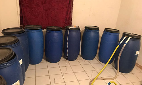 Liquor factory  busted;  40 drums found