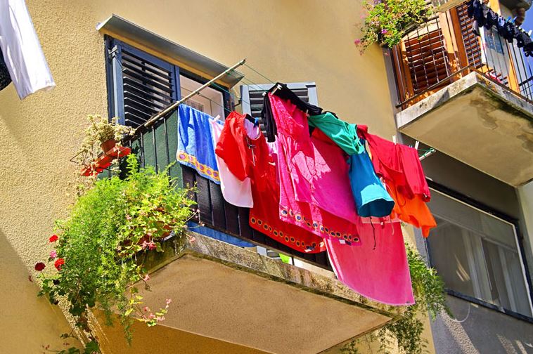 Upto 500 KD fine for hanging cloths in open balcony
