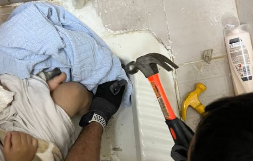 Firefighters rescue a child whose leg got stuck in a toilet in Mangaf