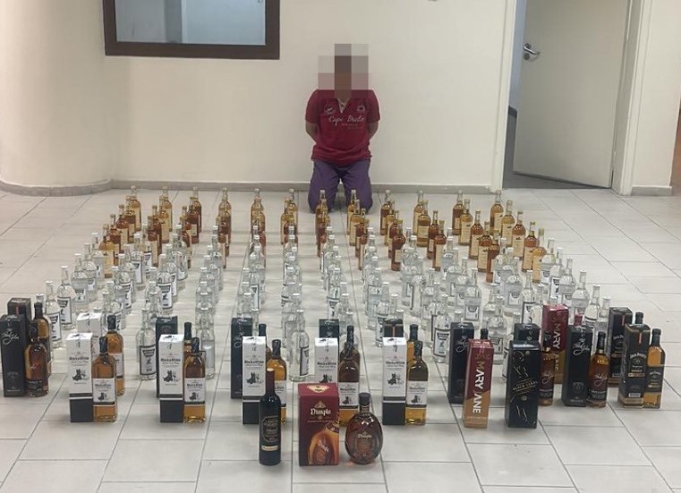 Asian arrested for making local liquor and selling as Foreign brands