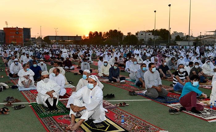 Muslims attend Eid Al-Adha prayers amid strict COVID-19 measures